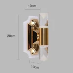 ⁦ابليك جداري مودرن ذهبي لون الانارة 3اضاءات 7 واط⁩ - الصورة ⁦2⁩