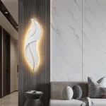 ⁦ابليك جداري ريش جداري طراز حديث ابيض مقاس وسط لون الانارة اصفر طول 62 *العرض 16 سم⁩ - الصورة ⁦6⁩