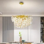 نجف مودرن شكل ذهبي مع عسلي شفاف يجمع بين الأناقة والأصالة 10 لمبات E14. مقاس 60 سم