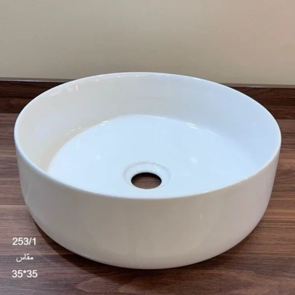 حوض سراميك مدور فوق الرخام